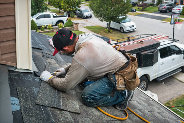 Professional Gutter Installation technician working in Cypress, TX